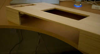 Illustration for article titled Lightning Review: Kangaroom Bamboo Laptop Stand and Charging Station